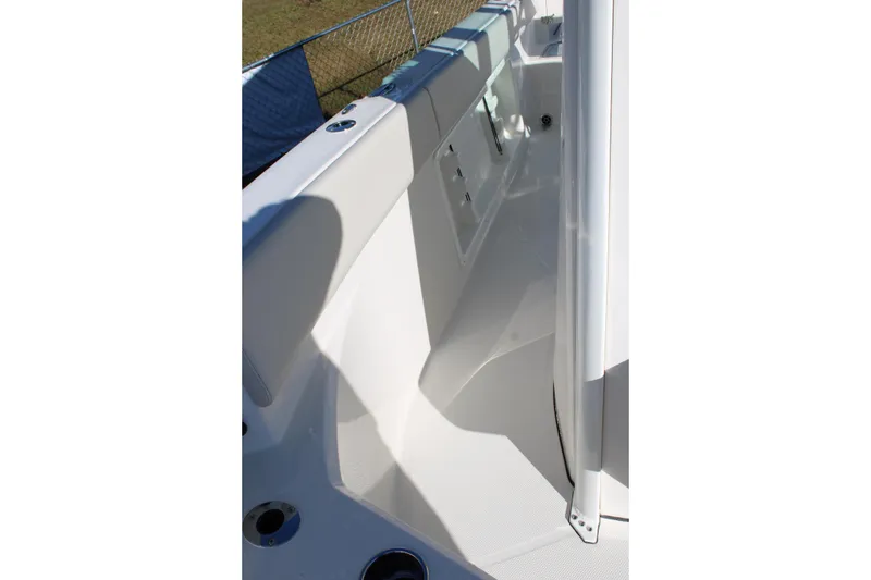 Slide: The Image of 2026 Sailfish 232 CC boat interior, featuring sleek white design and modern fittings. - 30