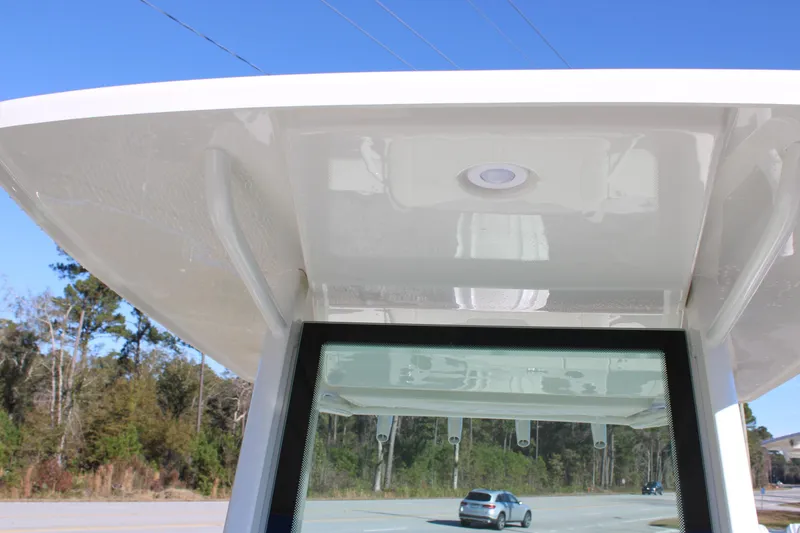Slide: The Image of 2026 Sailfish 232 CC boat canopy with LED light, viewed from below. - 32