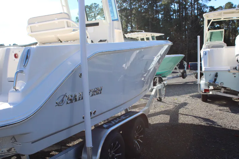 Slide: The Image of 2026 Sailfish 232 CC boat on trailer in outdoor setting. - 5
