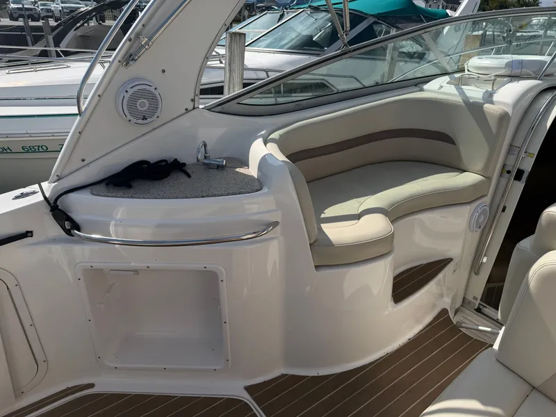 Slide: The Image of Interior of a 2005 Chaparral 290 Signature boat with seating area. - 10