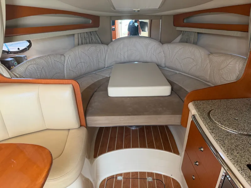 Slide: The Image of Interior of 2005 Chaparral 290 Signature yacht with seating area. - 17