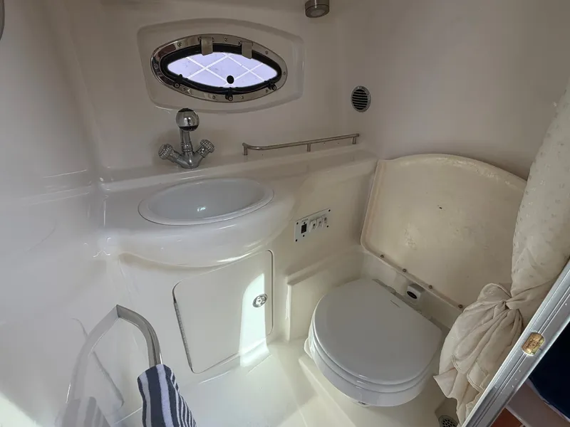 Slide: The Image of Interior of 2005 Chaparral 290 Signature with sink and toilet. - 22