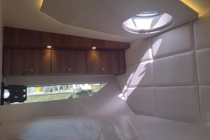 Slide: The Image of Interior cabin of 2023 Evolve 400HT yacht with modern design and porthole window. - 19