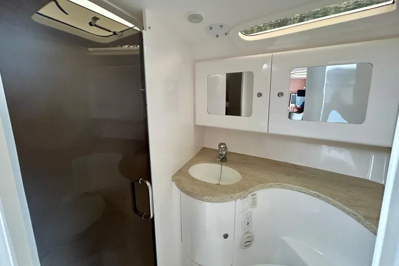 Slide: The Image of Luxurious bathroom interior of 2012 Intrepid 400 Cuddy boat with modern fixtures. - 36