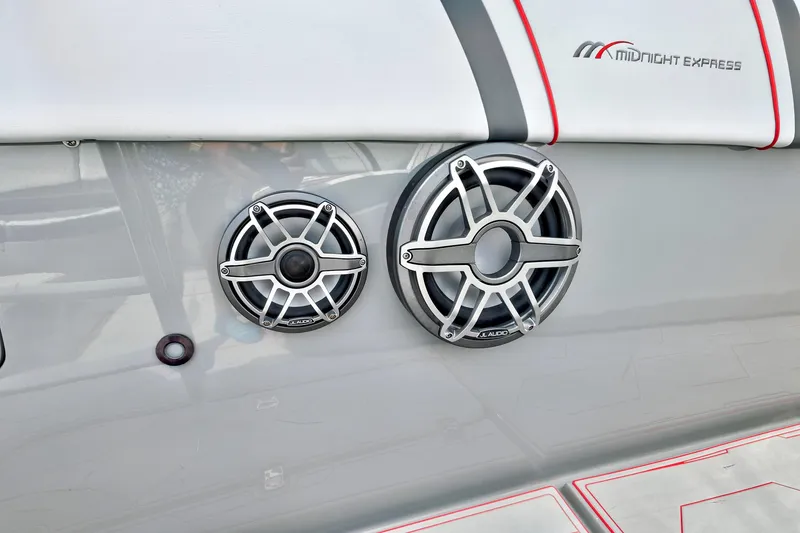 Slide: The Image of 2023 Midnight Express 43 Open boat speakers, featuring sleek JL Audio design. - 19