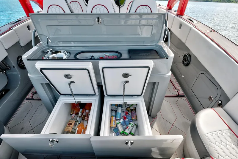 Slide: The Image of 2023 Midnight Express 43 Open boat interior with open coolers and refreshments. - 28