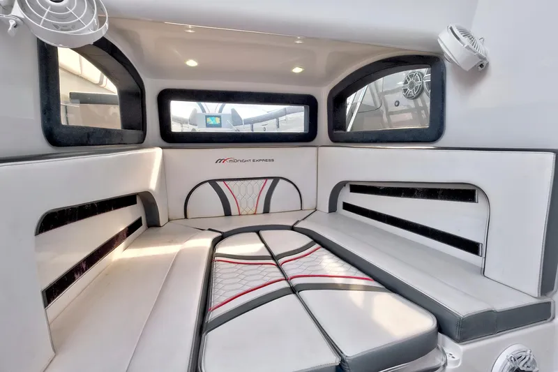 Slide: The Image of Luxurious interior of 2023 Midnight Express 43 Open boat with modern seating and windows. - 34
