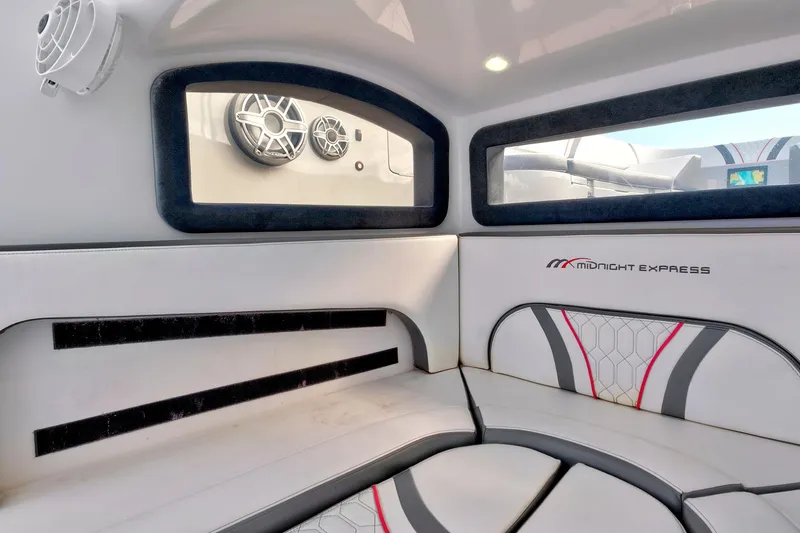 Slide: The Image of Interior of 2023 Midnight Express 43 Open boat with modern seating and speakers. - 36