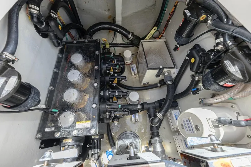 Slide: The Image of Engine compartment of 2023 SeaVee 370Z boat, showcasing complex mechanical systems and components. - 20