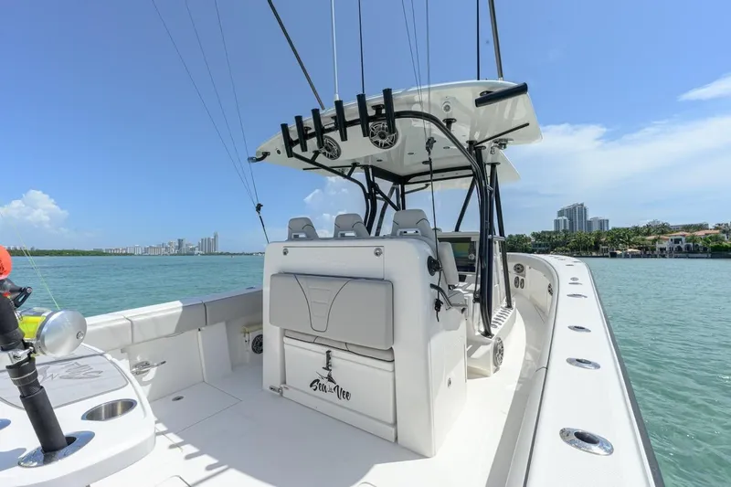 Slide: The Image of 2023 SeaVee 370Z boat on water, featuring sleek design and modern amenities. - 6