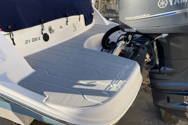 Slide: The Image of 2020 Regal 21 OBX boat with Yamaha outboard motor, rear view. - 11