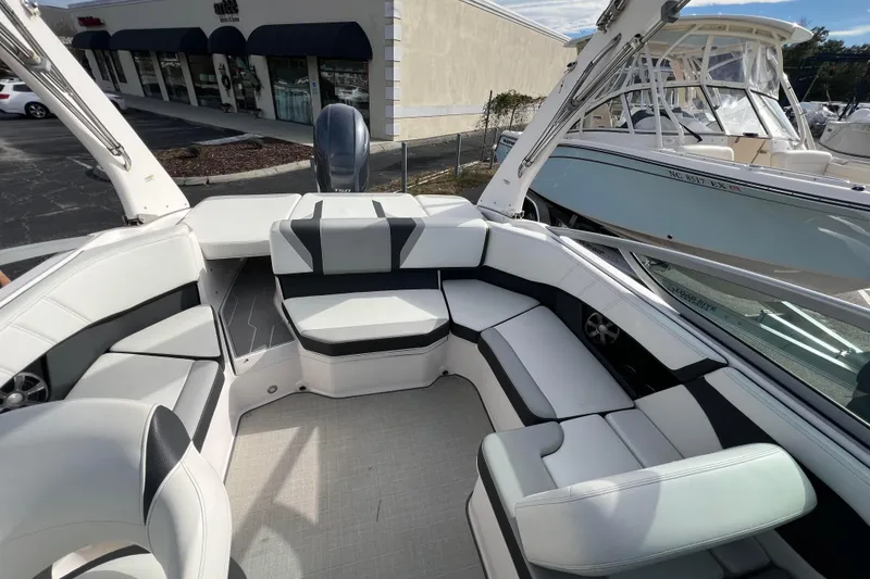 Slide: The Image of 2020 Regal 21 OBX boat interior with spacious seating and modern design. - 8