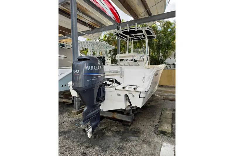 Slide: The Image of 2011 Sea Fox 226 Center Console boat with Yamaha 150 outboard motor in storage. - 10