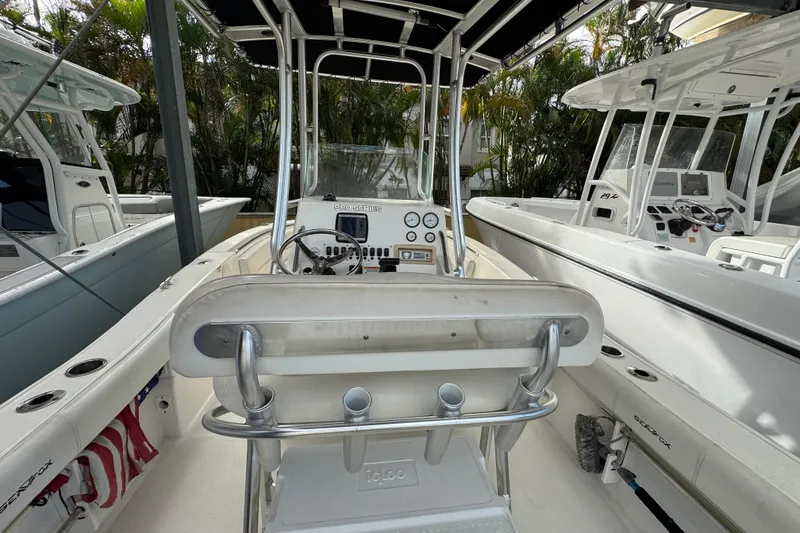 Slide: The Image of 2011 Sea Fox 226 Center Console boat interior with steering wheel and controls. - 15