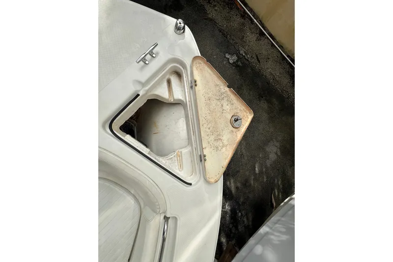 Slide: The Image of Open storage compartment on 2011 Sea Fox 226 Center Console boat. - 21