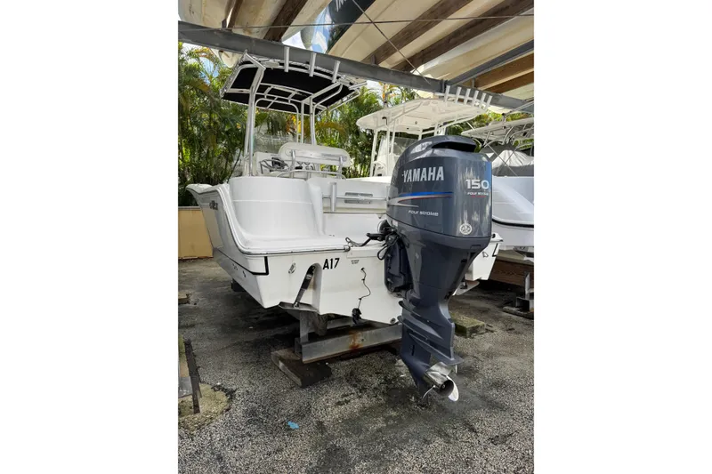 Slide: The Image of 2011 Sea Fox 226 Center Console boat with Yamaha 150 outboard motor in storage. - 9