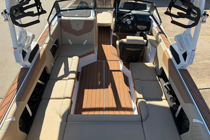Slide: The Image of 2026 Nautique Super Air Nautique GS22 interior with luxurious seating and modern design. - 11
