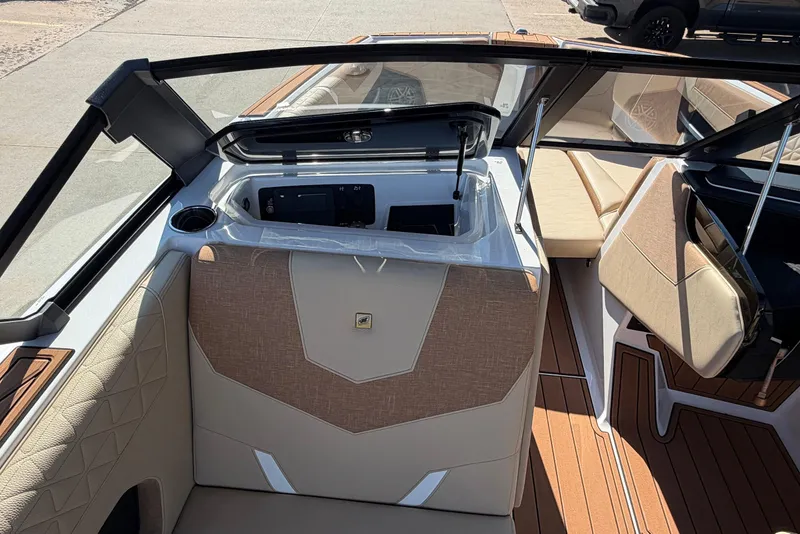 Slide: The Image of 2026 Nautique Super Air Nautique GS22 interior with modern seating and dashboard design. - 27
