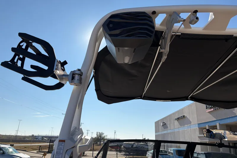 Slide: The Image of 2026 Nautique Super Air Nautique GS22 boat tower with speaker and wakeboard rack. - 63