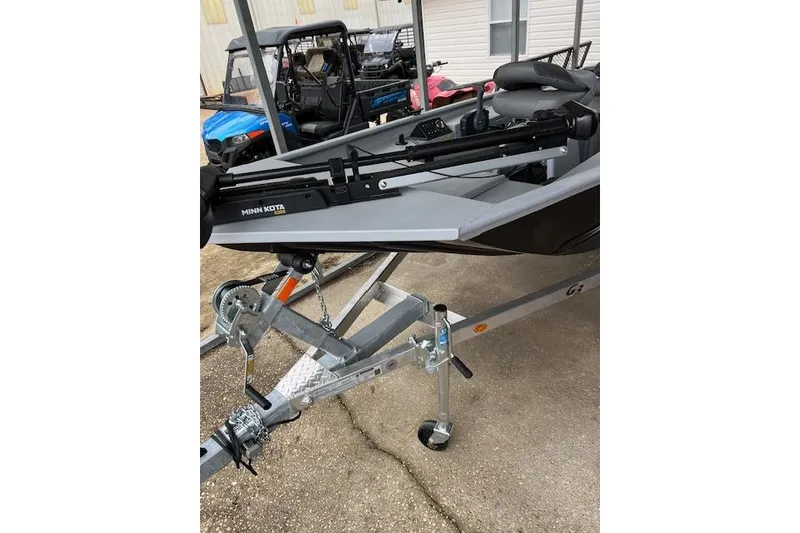 Slide: The Image of 2025 G3 Sportsman 1610 SS boat on trailer with Minn Kota trolling motor. - 3