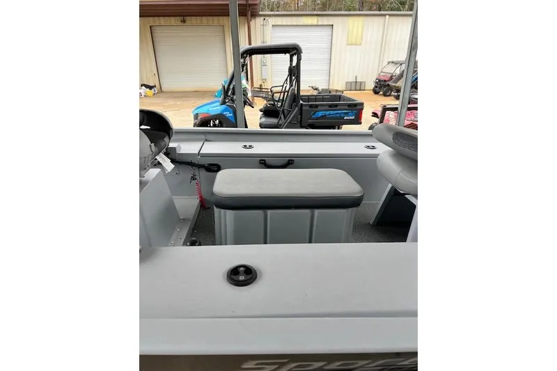 Slide: The Image of 2025 G3 Sportsman 1610 SS boat interior with seating and storage. - 4