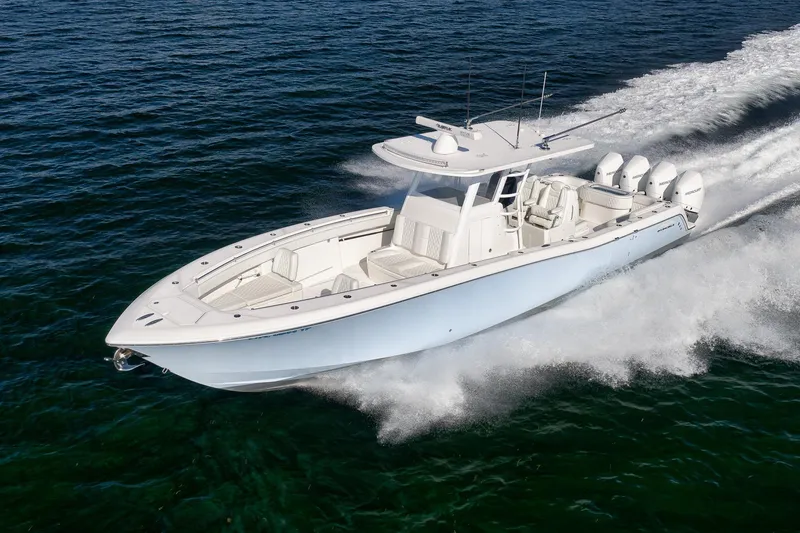 Slide: The Image of 2022 Invincible 39 Open Fisherman boat cruising on open water. - 2