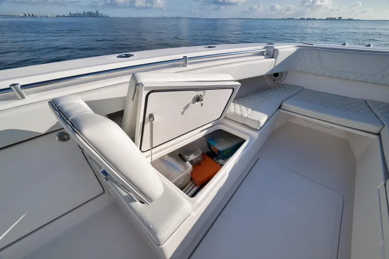 Slide: The Image of 2022 Invincible 39 Open Fisherman boat interior with storage compartment open. - 35