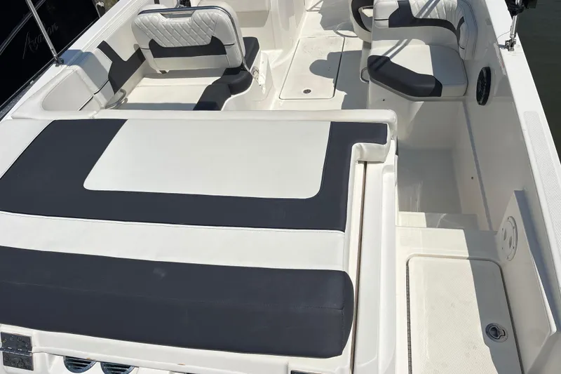 Slide: The Image of 2024 Bayliner VR6 Bowrider OB interior with sleek seating and modern design. - 10
