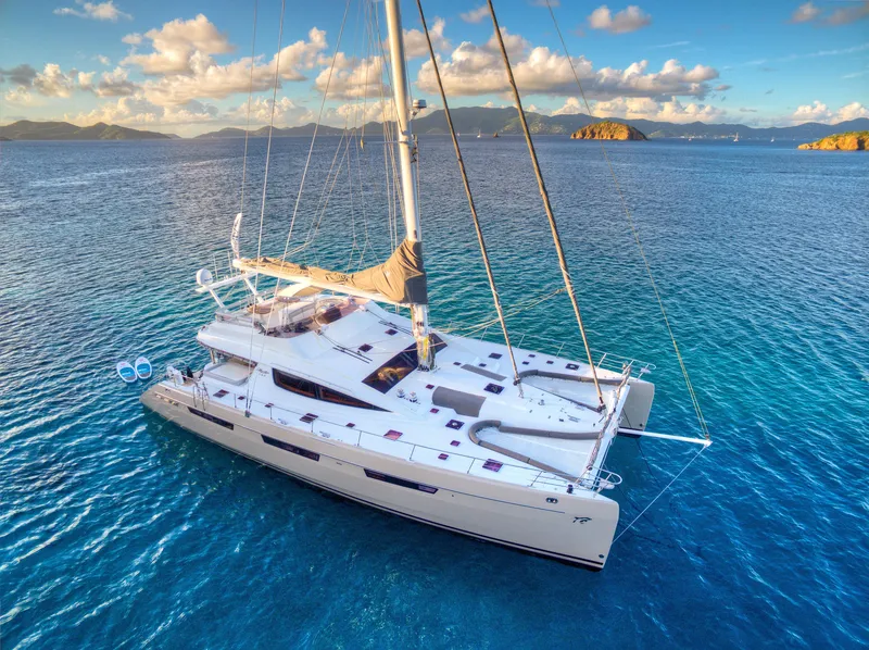 The Image of Luxury Privilege 745 catamaran sailing in clear blue waters, 2010 model. - 0