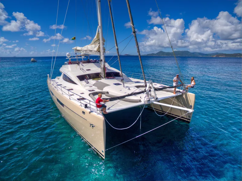 Slide: The Image of Privilege 745 catamaran sailing in clear blue waters, 2010 model. - 18