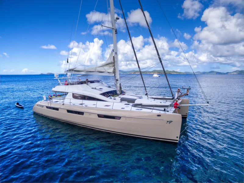Slide: The Image of Luxury Privilege 745 catamaran sailing in clear blue waters, 2010 model. - 20