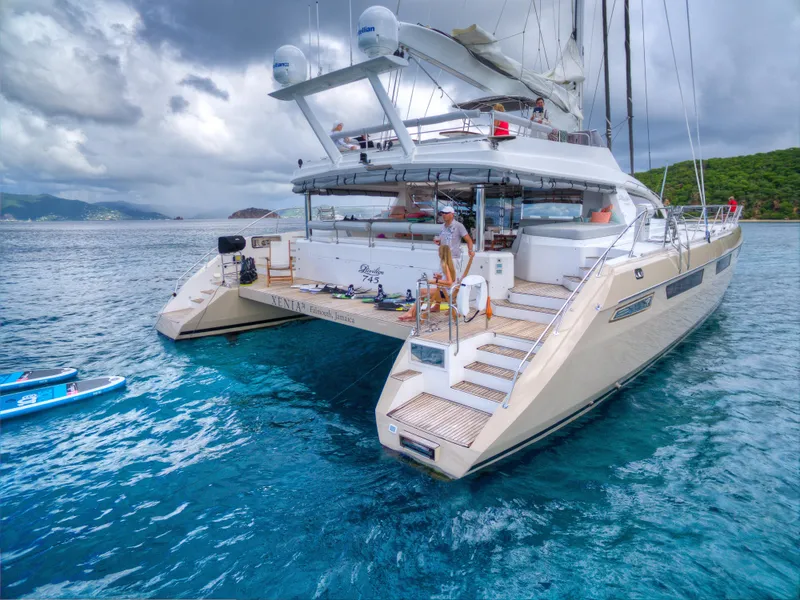 Slide: The Image of Luxury Privilege 745 yacht, 2010 model, anchored in clear blue waters with scenic backdrop. - 22