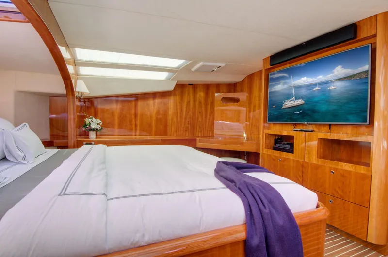Slide: The Image of Luxurious bedroom in 2010 Privilege 745 yacht with TV and skylight. - 33