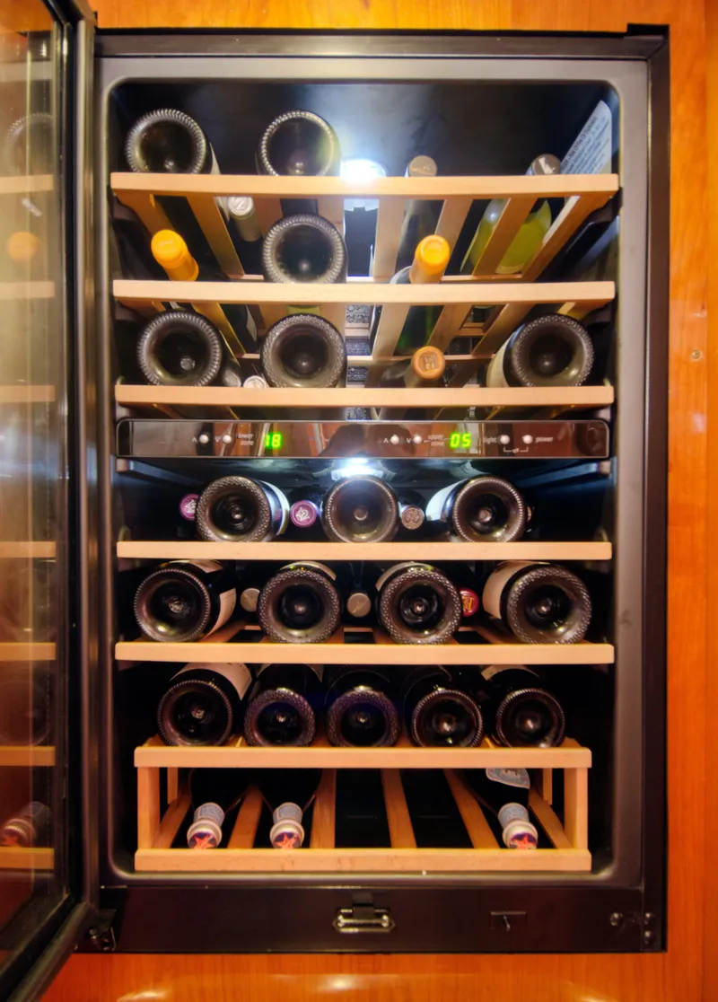 Slide: The Image of Wine cooler filled with assorted bottles, Privilege 745 model, 2010. - 45