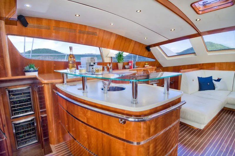 Slide: The Image of Luxurious interior of 2010 Privilege 745 yacht with modern bar and seating area. - 49