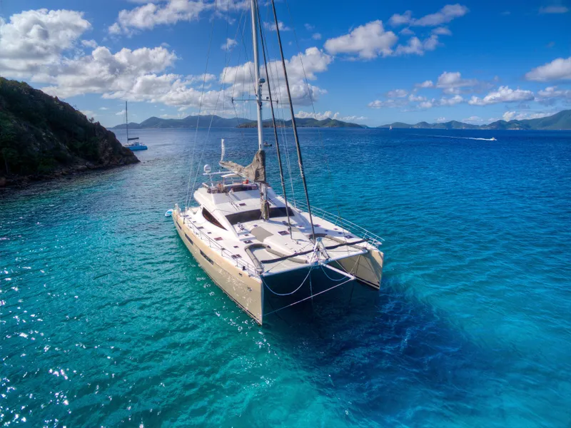 Slide: The Image of Luxury Privilege 745 catamaran sailing in clear blue waters, 2010 model. - 5