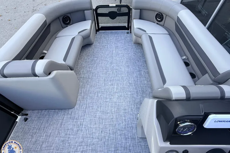 Slide: The Image of 2026 Premier 220 Sunscape RF boat interior with gray seating and modern design. - 4