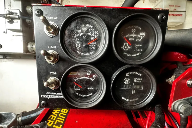 Slide: The Image of Control panel of a 2003 Rampage 38 Express with Westerbeke generator gauges. - 14