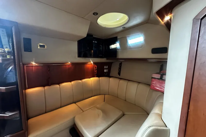 Slide: The Image of Luxurious interior of 2003 Rampage 38 Express yacht with plush seating and ambient lighting. - 5