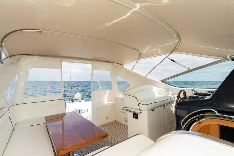 Slide: The Image of Interior of 2001 Uniesse 48 Open yacht with ocean view. - 13