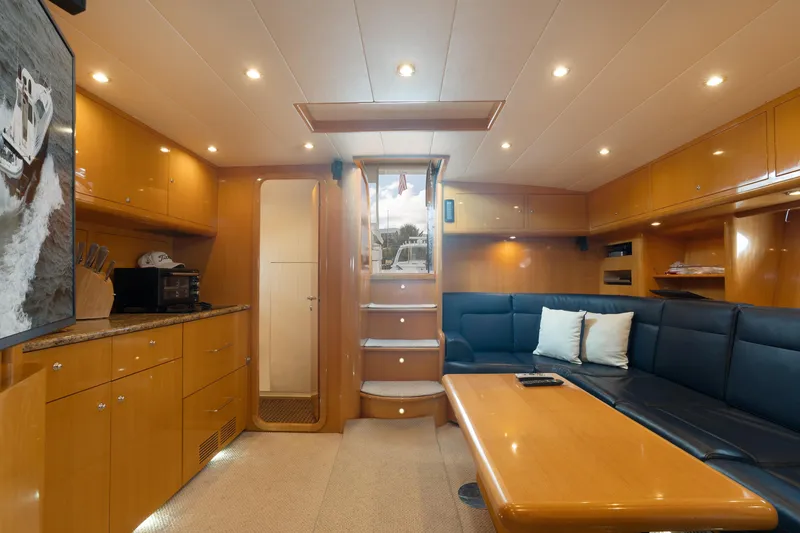 Slide: The Image of Luxurious interior of 2001 Uniesse 48 Open yacht with modern furnishings and lighting. - 16
