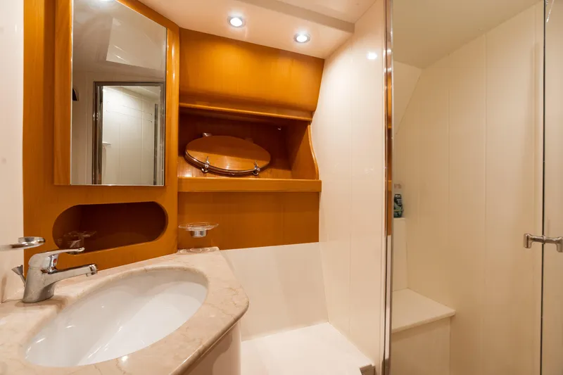 Slide: The Image of Luxurious bathroom interior of 2001 Uniesse 48 Open yacht with modern fixtures. - 22