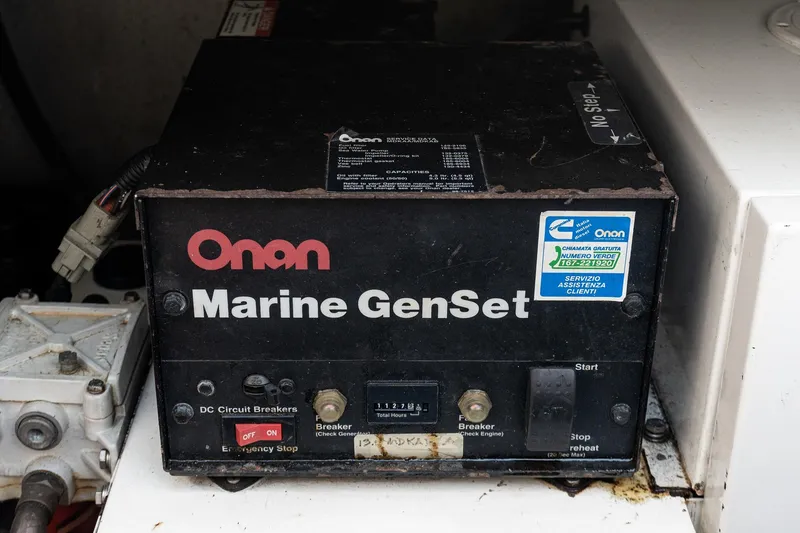 Slide: The Image of Onan Marine GenSet in 2001 Uniesse 48 Open yacht engine room. - 32