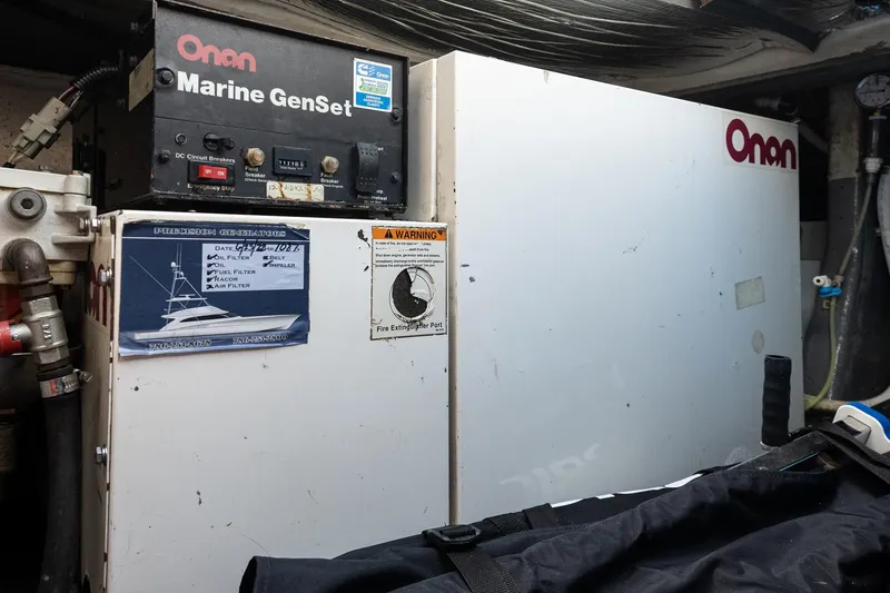 Slide: The Image of Onan Marine GenSet in 2001 Uniesse 48 Open engine room. - 33