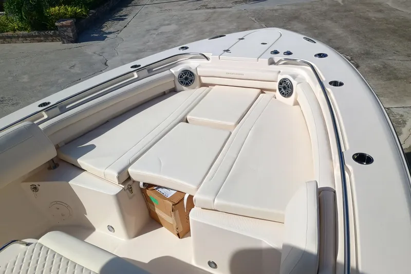 Slide: The Image of 2026 Grady-White Canyon 336 boat with luxurious seating area. - 11