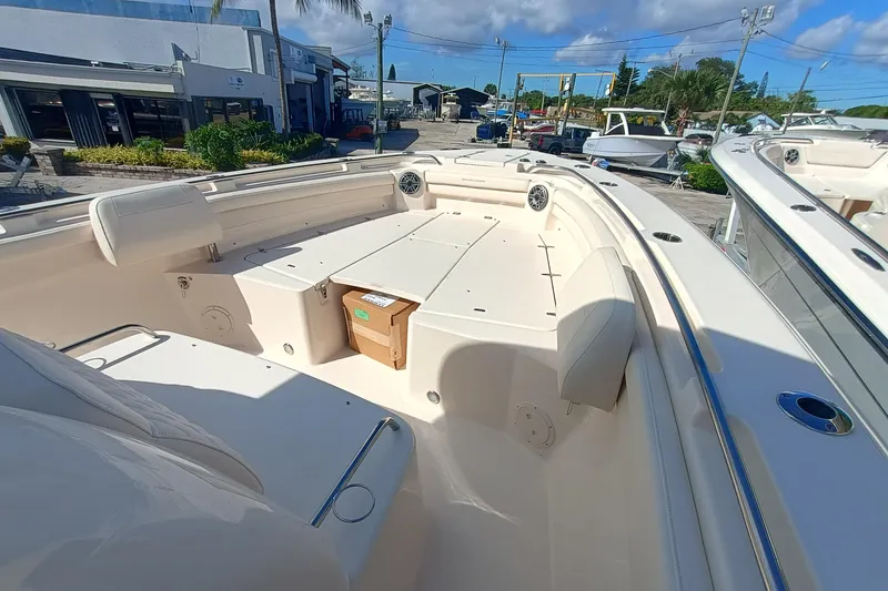 Slide: The Image of Grady-White Canyon 336 boat, spacious deck, 2026 model. - 13