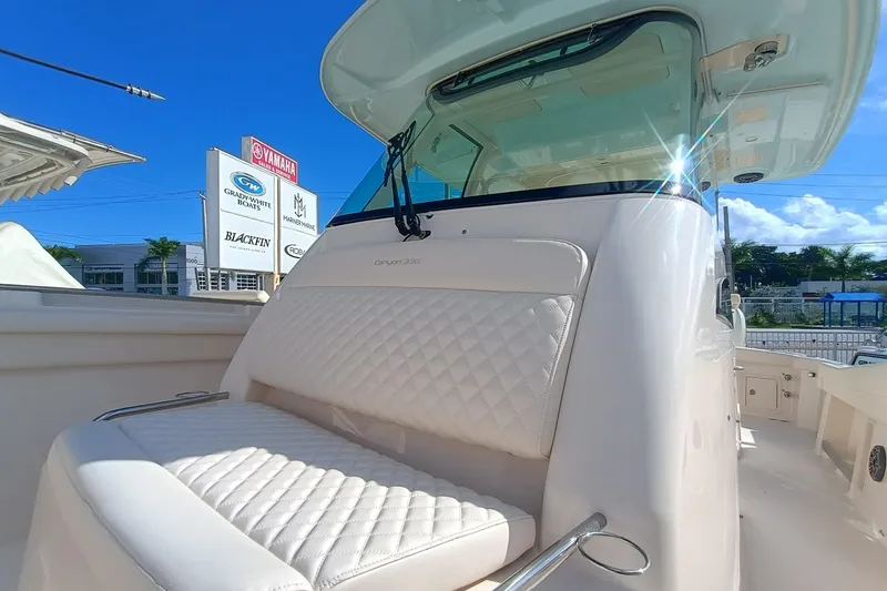 Slide: The Image of 2026 Grady-White Canyon 336 boat with cushioned seating. - 8