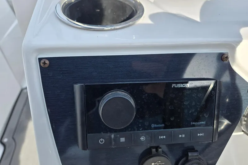 Slide: The Image of 2024 Godfrey Hurricane 235SD boat stereo system with Bluetooth connectivity. - 12