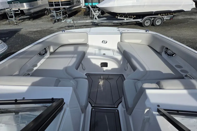 Slide: The Image of 2024 Godfrey Hurricane 235SD boat interior with spacious seating and modern design. - 16