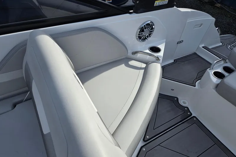 Slide: The Image of 2024 Godfrey Hurricane 235SD boat interior with sleek seating and cup holders. - 23